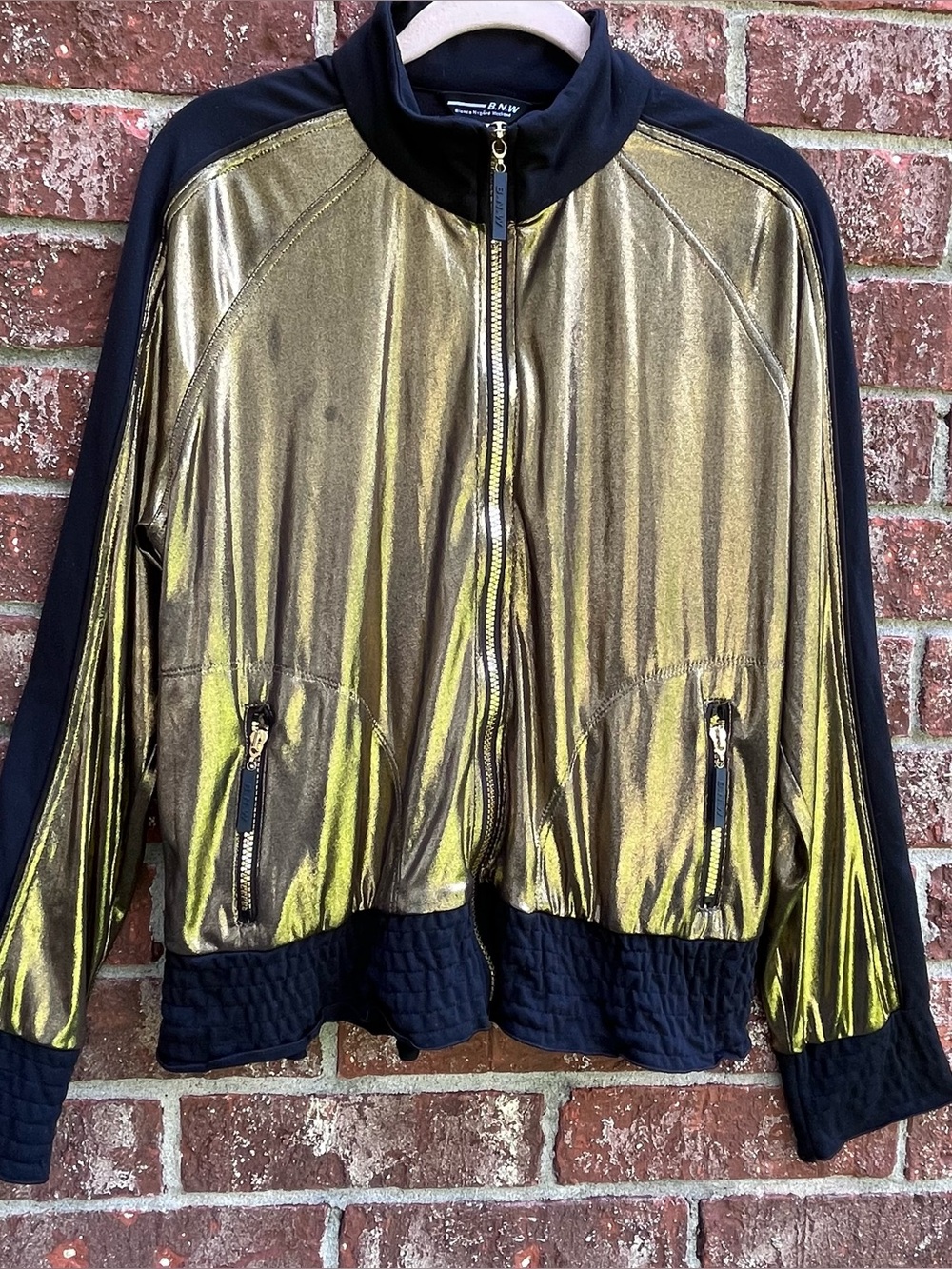 BNW gold metallic bomber jacket with black sleeves and hem, size 12